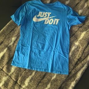 It's light blue perfect condition unisex worn once